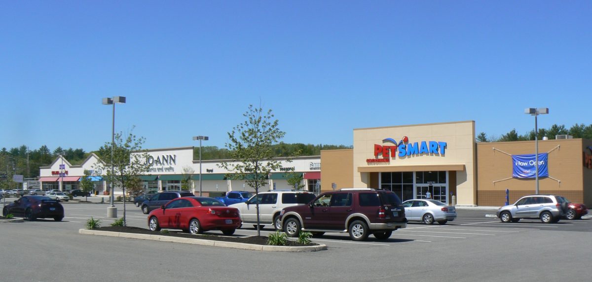 Rochester Crossing view of shops from parking lot